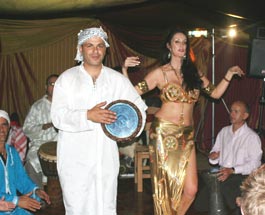 Belly dancer with drummer